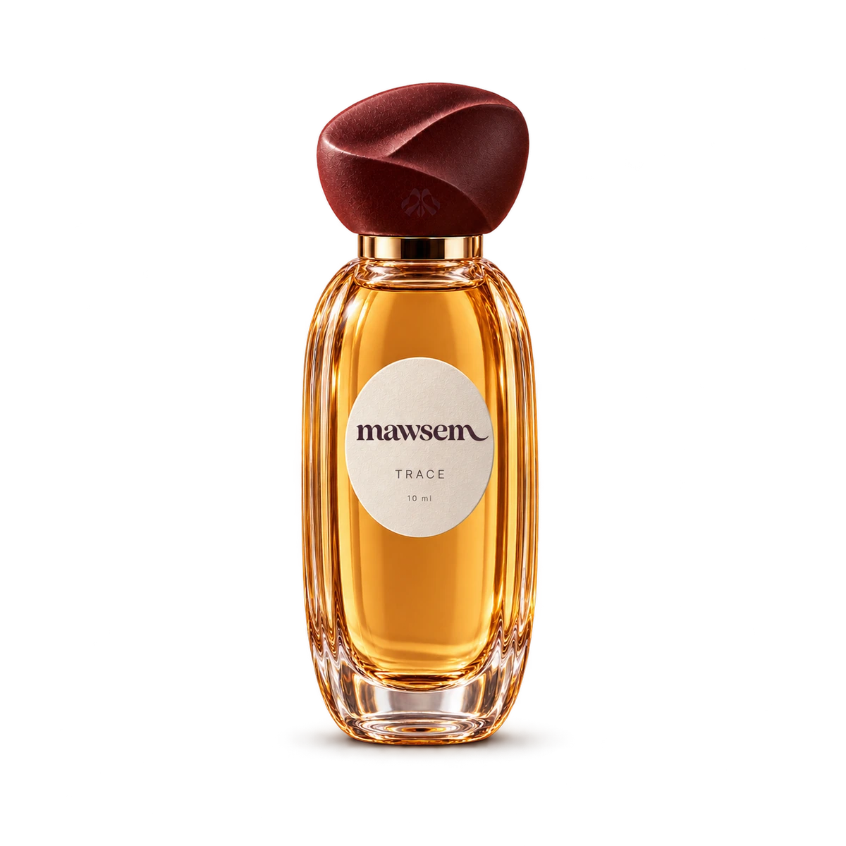 TRACE, 10 ml travel fragrance in slender fluted glass with an ivory label and wine-colored folded cap